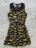 Dress with fish pattern on a gray surface